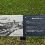 This sign explains how a charcoal kiln works