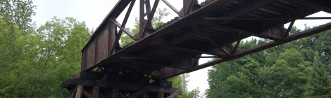 Michigan Roadside Attractions: 1st Avenue Railroad Overpass and Gogebic Range Iron Ore Discovery Site in Bessemer