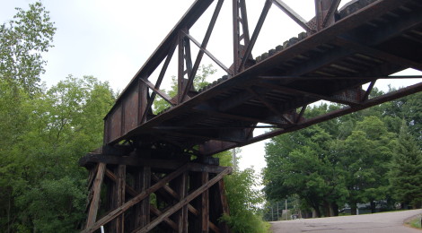 Michigan Roadside Attractions: 1st Avenue Railroad Overpass and Gogebic Range Iron Ore Discovery Site in Bessemer