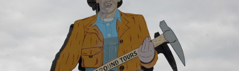 Michigan Roadside Attractions: "Big John" Miner Sign at Iron Mountain Iron Mine