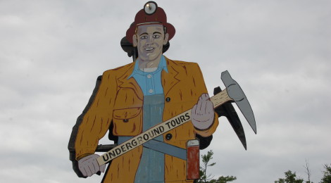 Michigan Roadside Attractions: "Big John" Miner Sign at Iron Mountain Iron Mine