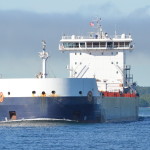 Freighter Algoma Harvester passes by our Soo Locks Boat Cruise boat