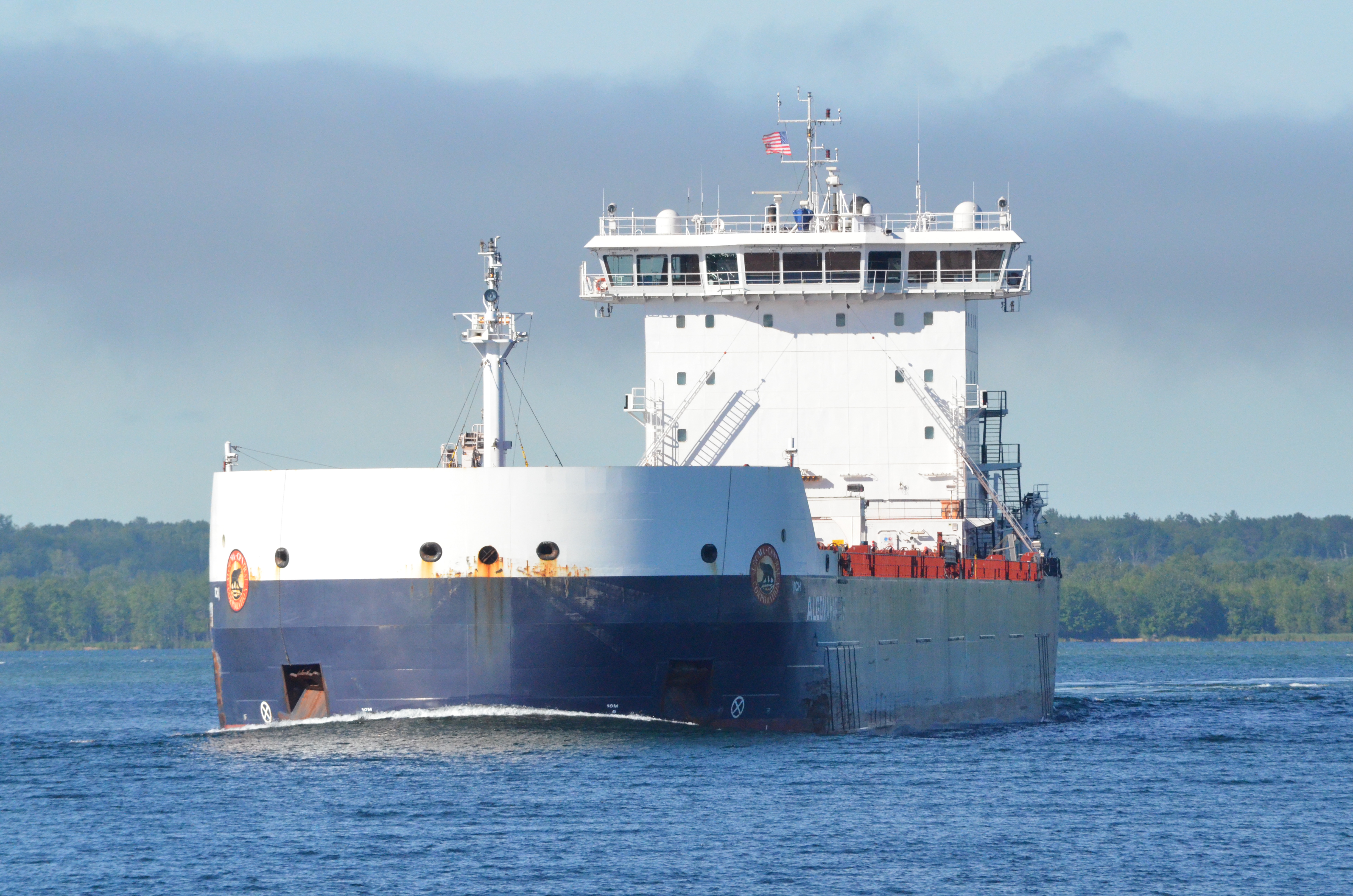 Freighter Algoma Harvester passes by our Soo Locks Boat Cruise boat