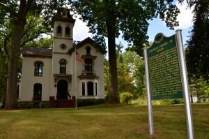 Michigan Historical Marker House With a Clock in Its Walls