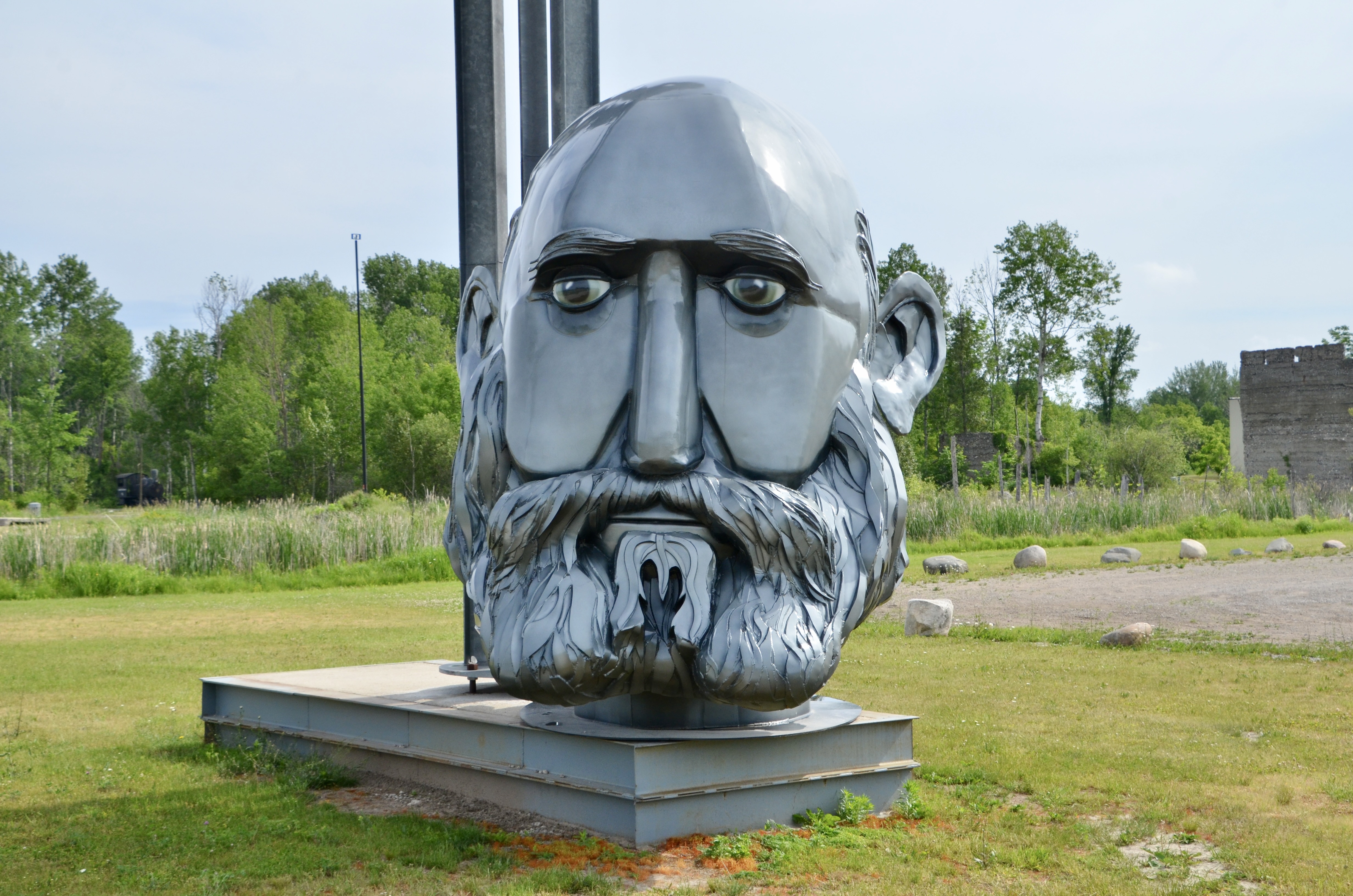 Awakon Park Entrance Onaway Michigan Bearded Man Sculpture
