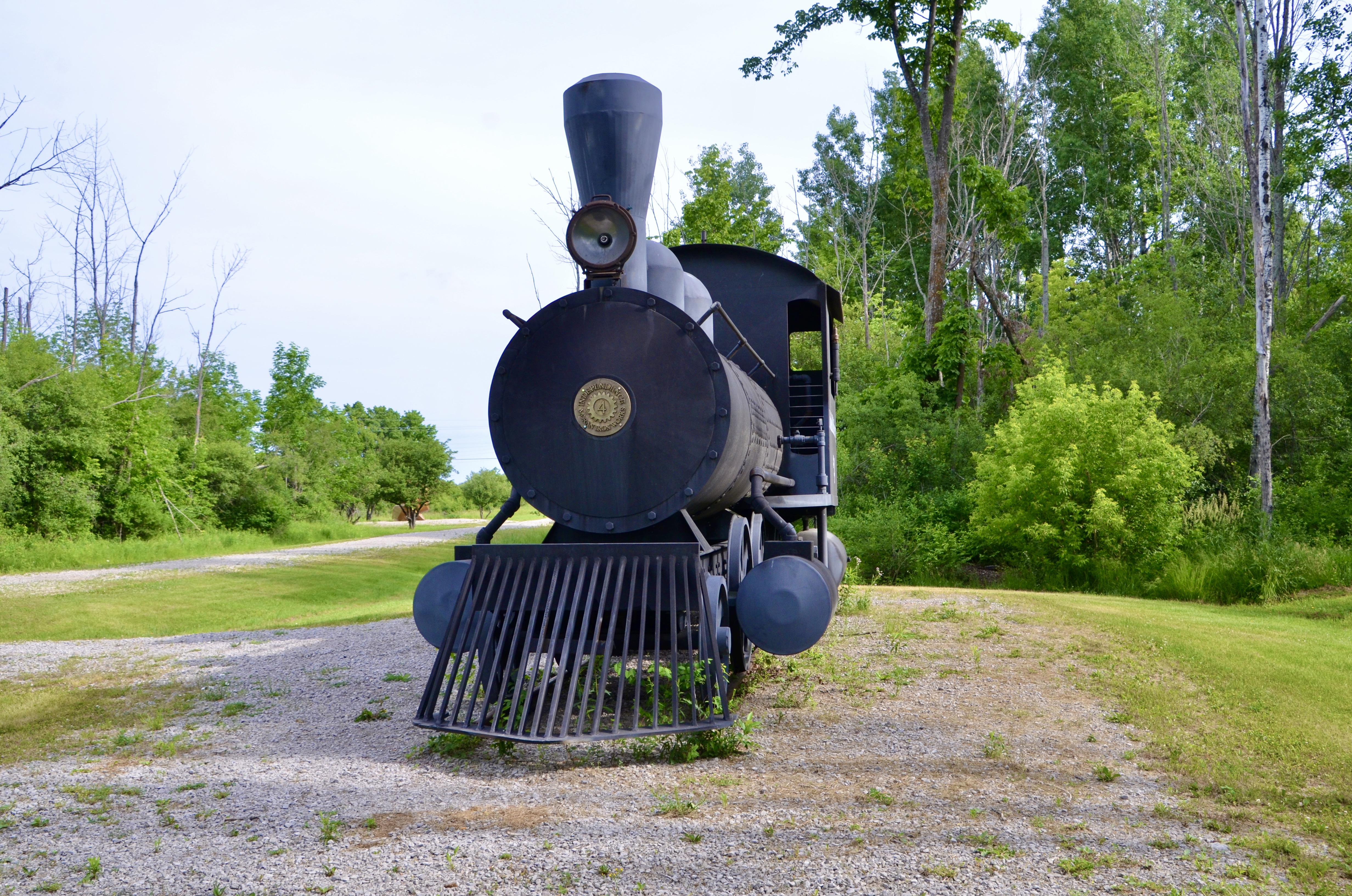 Lobdell & Emery Train Sculpture at Awakon Park in Onaway, June