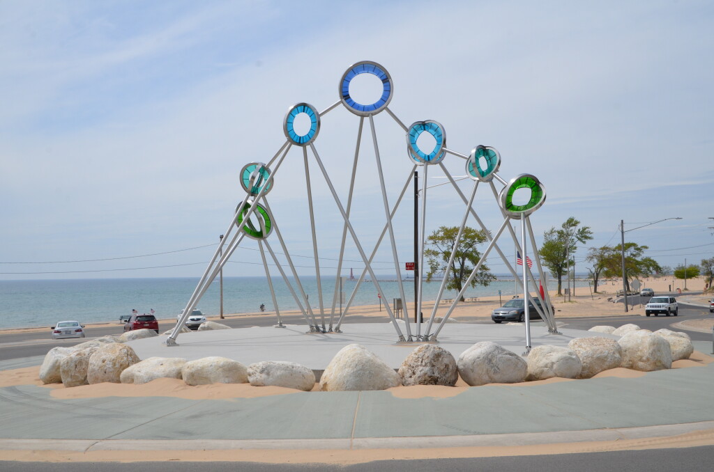 Celebrating Muskegon sculpture at Pere Marquette Beach, May