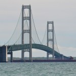 Great Lakes Trader passing under the Mackinac Bridge, June