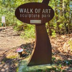 Walk of Art Sculpture Park Elk Rapids Sign - Art Brown